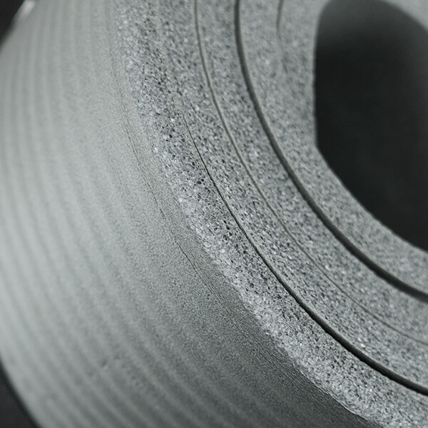 Fitness mat close up rolled up